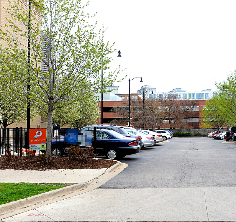 Street view of Black and White Parking