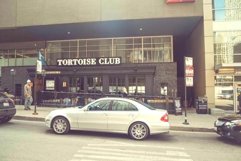 Street view of Tortoise Club Restaurant - Valet Kiosk